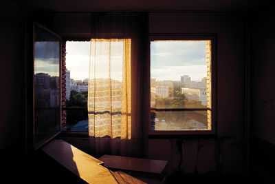 Buildings seen through glass window