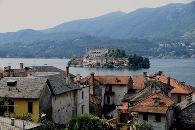 High angle view of village by the water