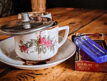 Close-up of tea cup on table