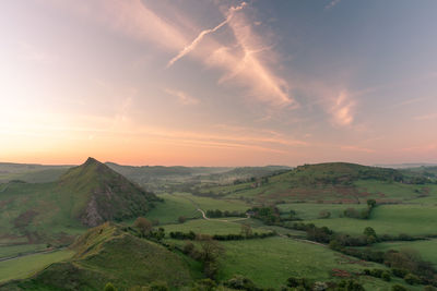 Scenic view of landscape against sky during sunset