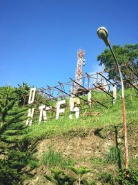 Low angle view of built structure against blue sky