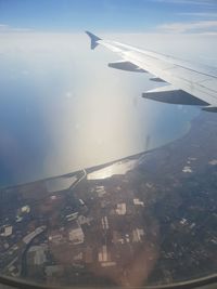 Aerial view of city against sky