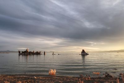 Scenic view of sea against sky at dusk