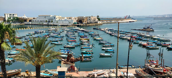 High angle view of boats in harbor