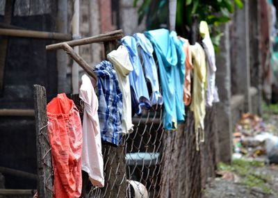 Clothes drying on fence