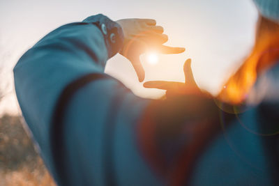 Cropped hand of woman holding hands