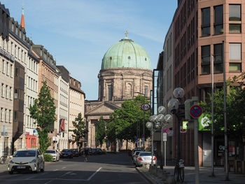 People walking on street in city