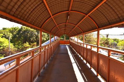 Footbridge along trees