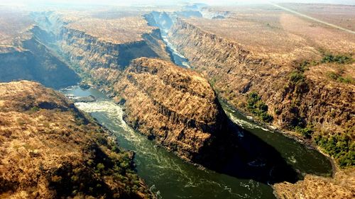 Scenic view of lake by mountains