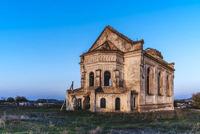 Historic building against clear blue sky