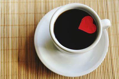 Directly above shot of coffee cup on table