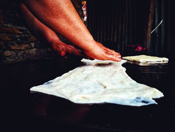 Midsection of person preparing food