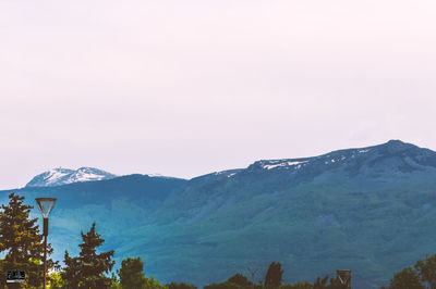 Scenic view of mountains against clear sky