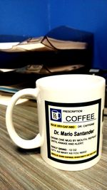 Close-up of coffee cup on table