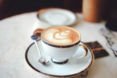 Coffee cup on table