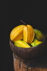 Close-up of fruit against black background