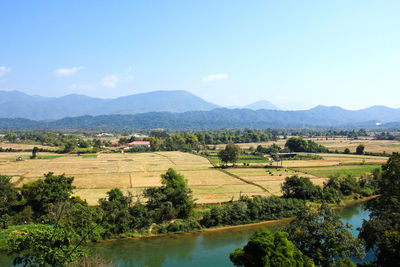 Scenic view of landscape and mountains against sky