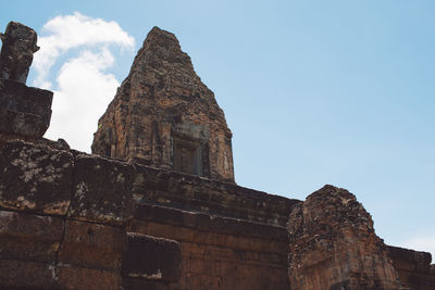 Low angle view of old building against sky