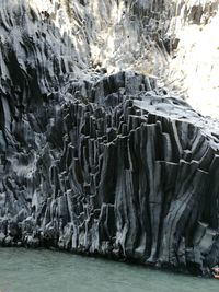 Rock formations by lake