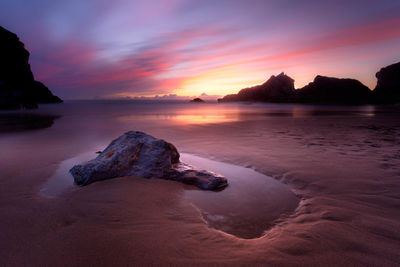 Scenic view of sea at sunset