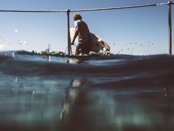 Man with surfboard