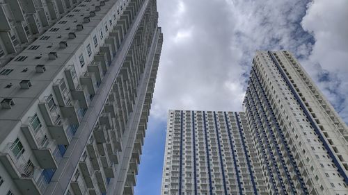 Low angle view of modern buildings against sky