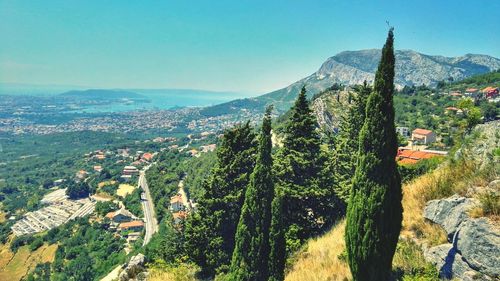 Scenic view of landscape against blue sky