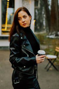 Young woman using mobile phone