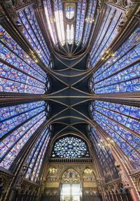 Low angle view of ceiling of la sainte chapelle in paris