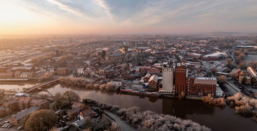 High angle view of townscape against sky during sunset