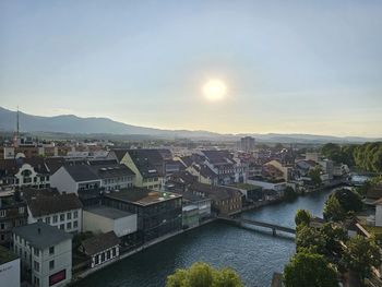 High angle view of townscape against sky during sunset