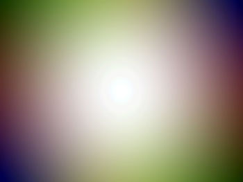 Defocused image of illuminated bright sun