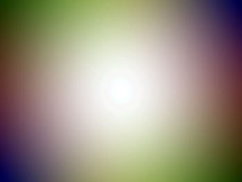 Defocused image of illuminated bright sun