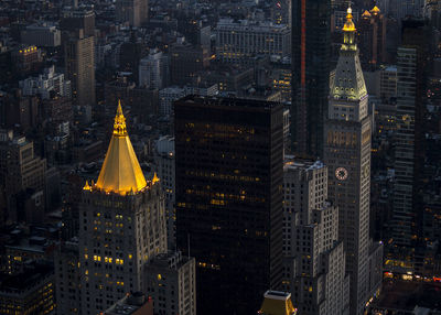 Aerial view of city lit up at night