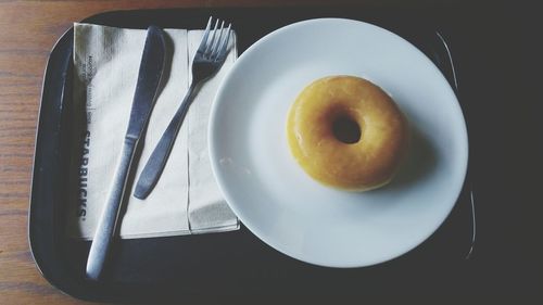 High angle view of egg in plate on table