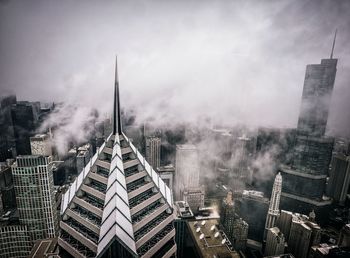 Aerial view of city against sky