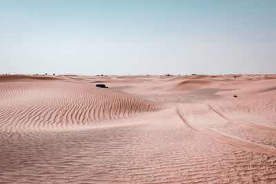 Scenic view of desert against clear sky