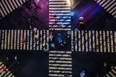 High angle view of people walking in corridor