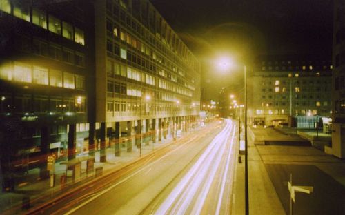 Traffic on city street at night