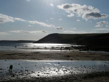 Scenic view of beach against sky