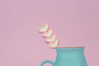 Close-up of pink cake against gray background