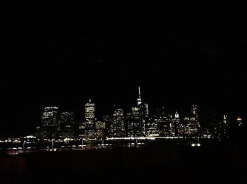 Illuminated cityscape at night