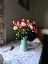 Close-up of pink flowers on table