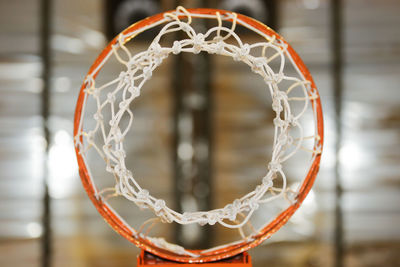 Directly below shot of basketball hoop