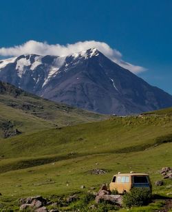 Scenic view of snowcapped mountains against sky