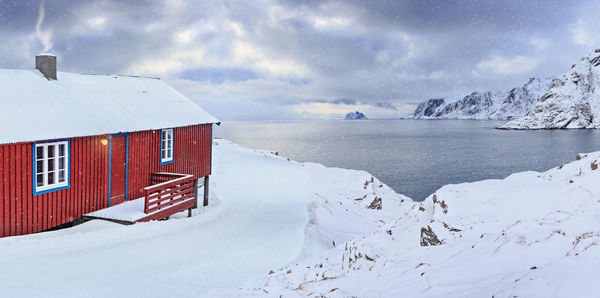 Scenic view of snowcapped mountain against sky during winter