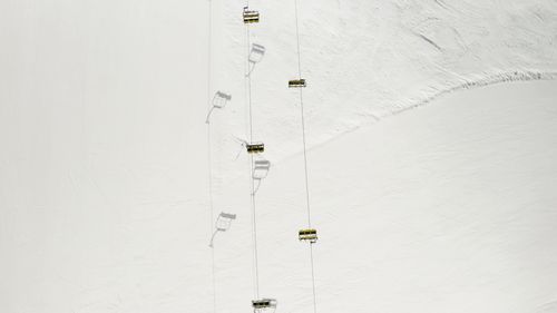 High angle view of people walking on wall