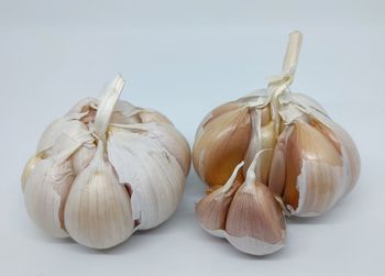 Close-up of pumpkins against white background