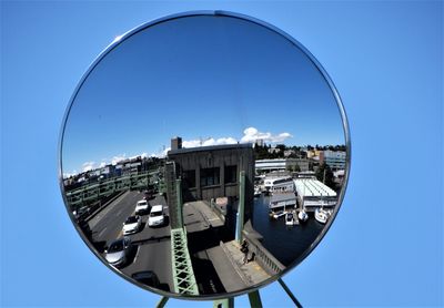 Buildings against clear blue sky