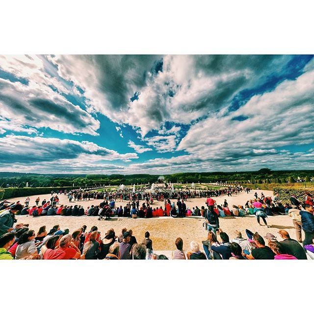 large group of people, transfer print, sky, lifestyles, leisure activity, person, auto post production filter, men, relaxation, cloud - sky, vacations, cloud, mountain, landscape, sitting, crowd, mixed age range, tourist, enjoyment